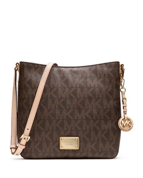 michael kors jet set large travel logo messenger brown|Michael Kors jet Messenger.